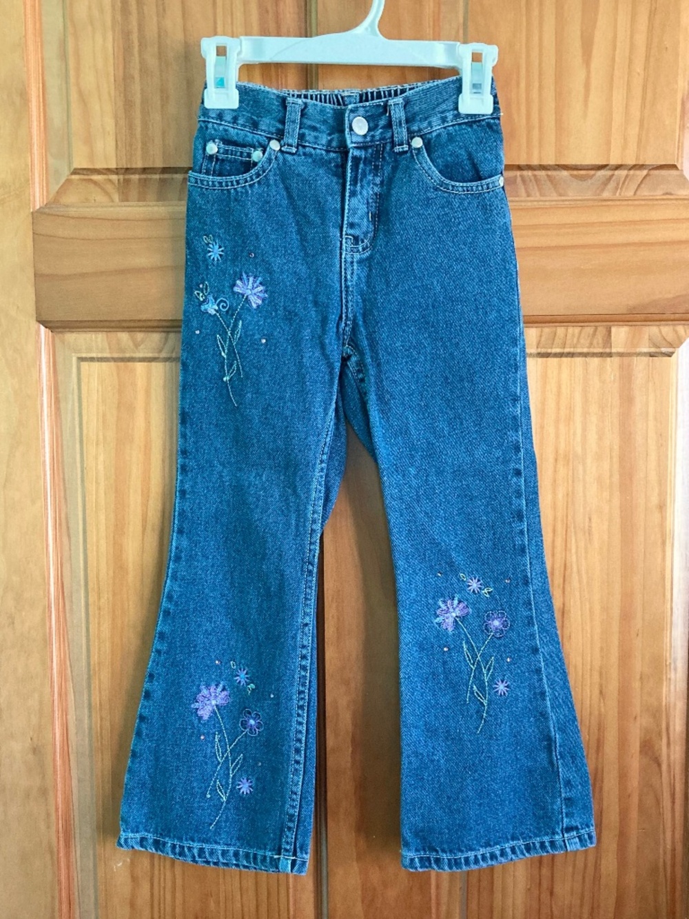 Circo girls size 6 blue jeans with purple flowers embroidery